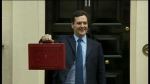 George Osborne holding the traditional Budget briefcase